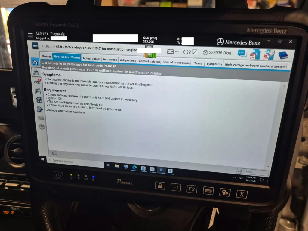 Mercedes-Benz XENTRY diagnostic screen listing the symptoms and requirements for resetting fault code P14031F AdBlue system fault
